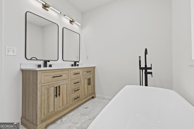 bathroom with vanity and a washtub