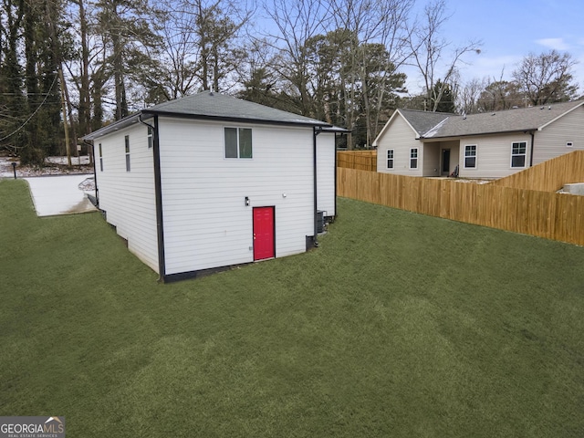 view of outdoor structure with a lawn