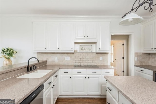 kitchen with sink, dishwasher, hanging light fixtures, tasteful backsplash, and white cabinets