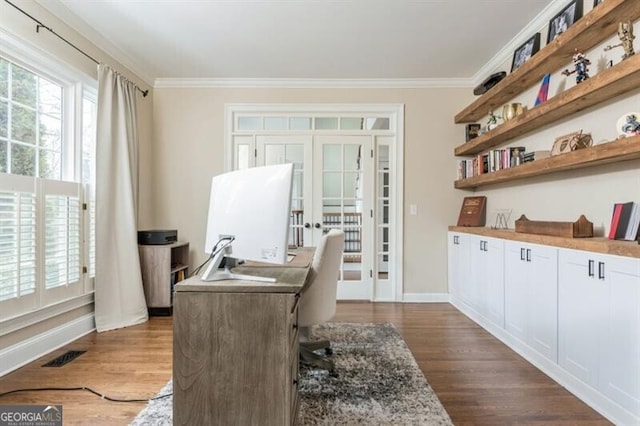 office space with ornamental molding, dark hardwood / wood-style floors, and french doors