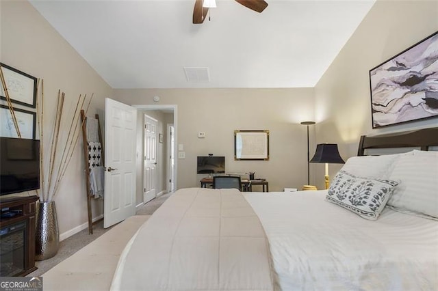 carpeted bedroom featuring ceiling fan