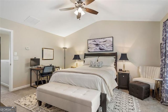 bedroom featuring lofted ceiling, light carpet, and ceiling fan