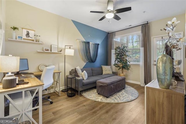 office space with hardwood / wood-style flooring and ceiling fan