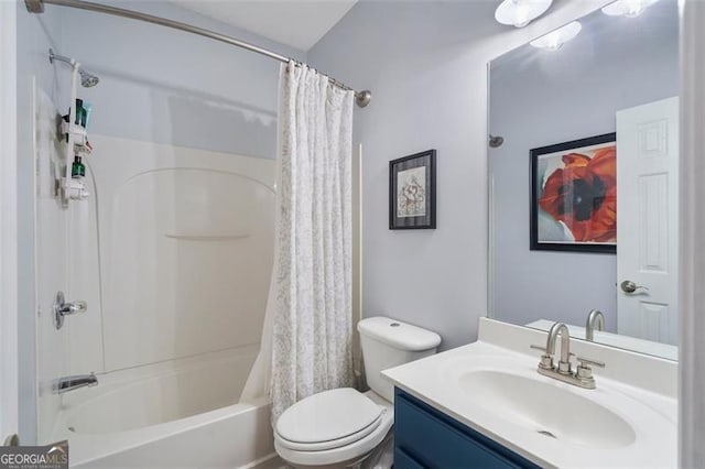 full bathroom featuring vanity, shower / bath combination with curtain, and toilet