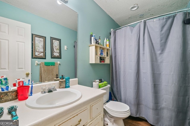 bathroom featuring toilet, a textured ceiling, vanity, a shower with shower curtain, and hardwood / wood-style flooring