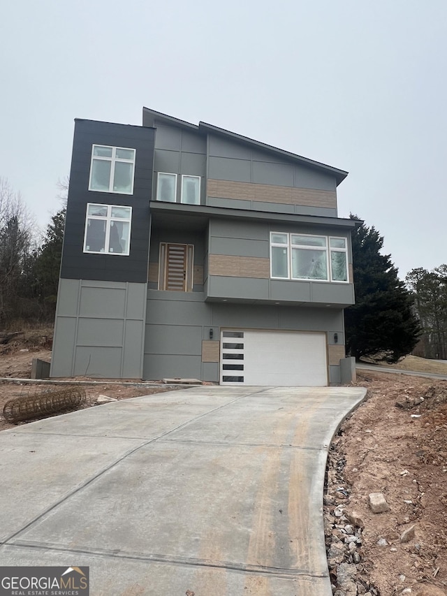 modern home featuring a garage