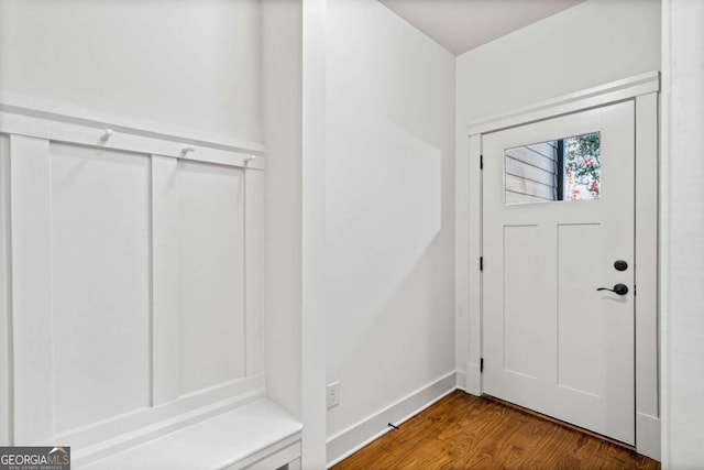 foyer entrance with wood-type flooring