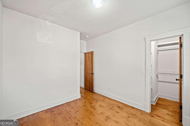 empty room with light wood-type flooring