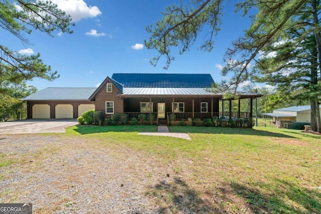 view of front of home featuring covered porch and a front yard