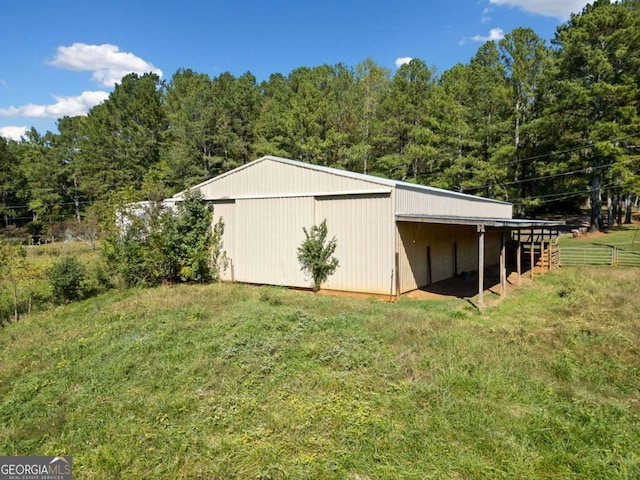 view of outdoor structure with a yard