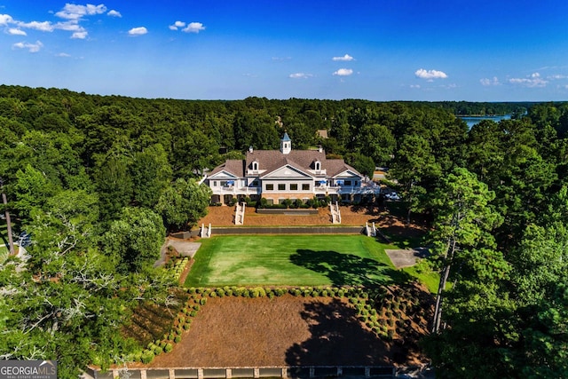 drone / aerial view with a view of trees