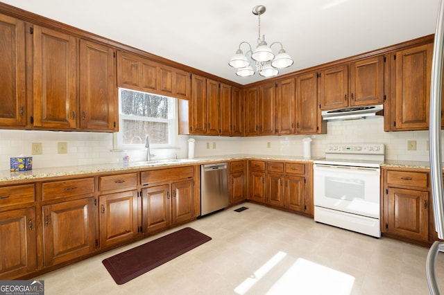 kitchen featuring pendant lighting, dishwasher, sink, white electric range oven, and light stone countertops