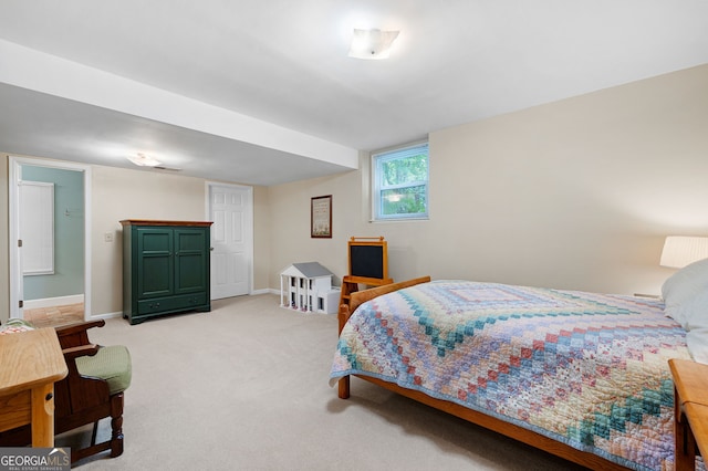 bedroom with light carpet