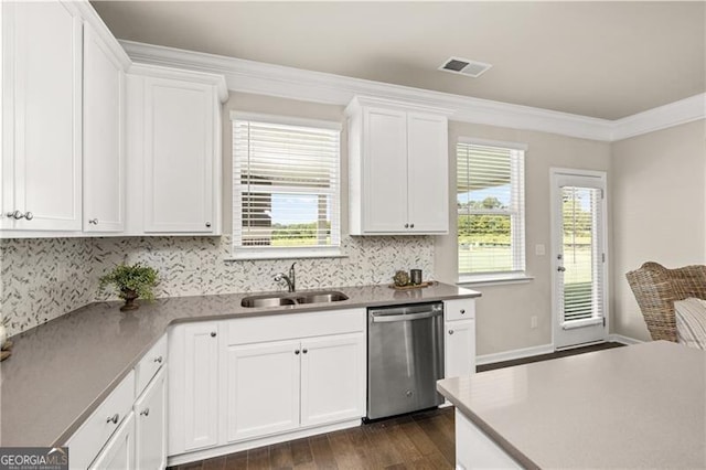 kitchen featuring sink, dark wood-type flooring, dishwasher, white cabinetry, and plenty of natural light