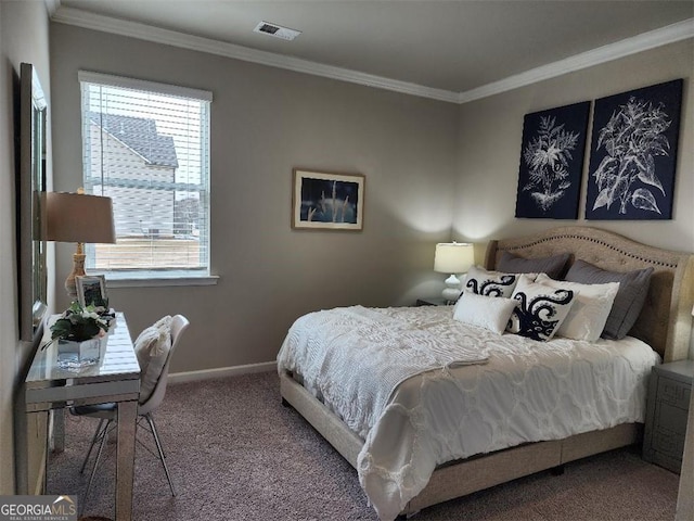 bedroom featuring ornamental molding and carpet floors