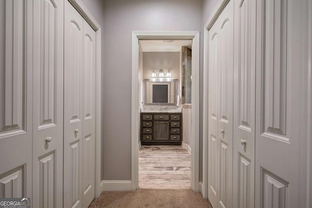 hallway with carpet