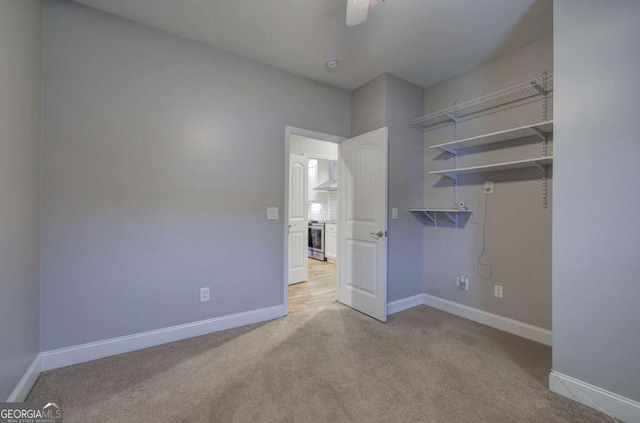 interior space featuring ceiling fan