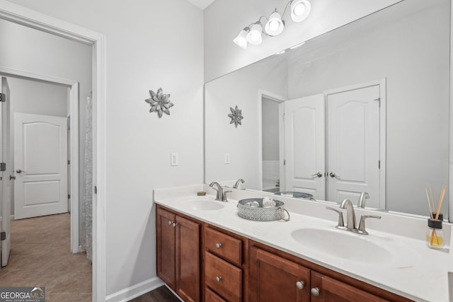 bathroom featuring vanity and tile patterned flooring