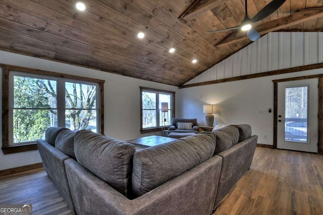 living room with vaulted ceiling with beams, wood ceiling, wood-type flooring, and ceiling fan