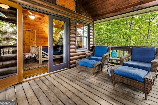 sunroom with wood ceiling and lofted ceiling