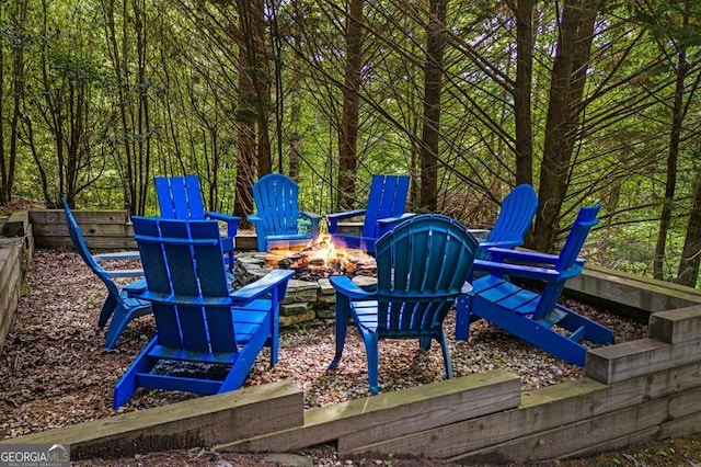 view of patio featuring a fire pit