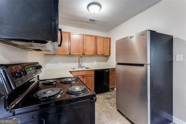 kitchen with sink and black appliances