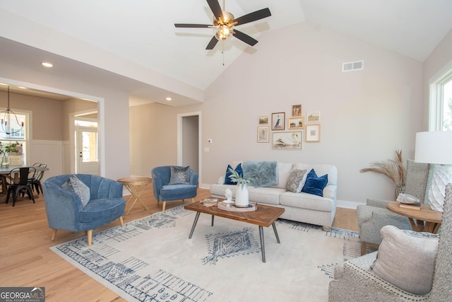 69 Oakhurst Trl, Sharpsburg, GA 30277 - living area featuring plenty of natural light, light wood-type flooring, ceiling fan, recessed lighting, and high vaulted ceiling