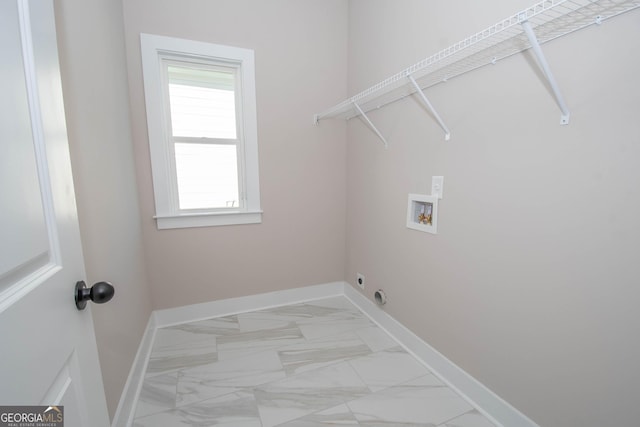 69 Oakhurst Trl, Sharpsburg, GA 30277 - laundry area with hookup for a washing machine, light marble finish floors, and electric dryer hookup
