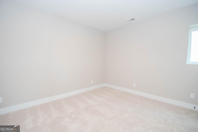 69 Oakhurst Trl, Sharpsburg, GA 30277 - carpeted spare room with baseboards