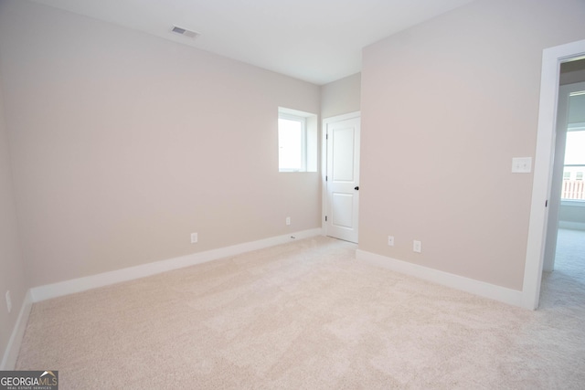 69 Oakhurst Trl, Sharpsburg, GA 30277 - unfurnished bedroom featuring carpet and baseboards