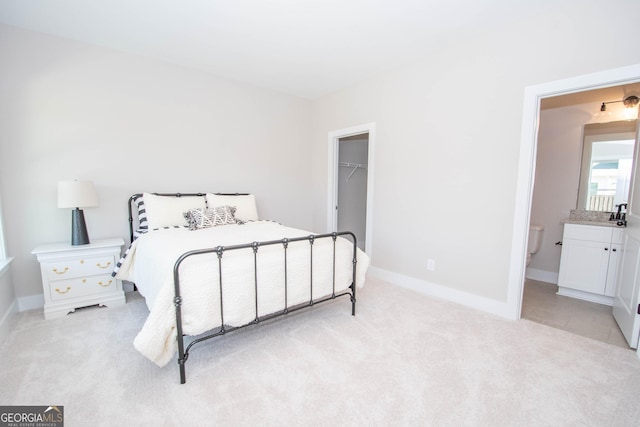 69 Oakhurst Trl, Sharpsburg, GA 30277 - bedroom with light carpet, a spacious closet, and a closet