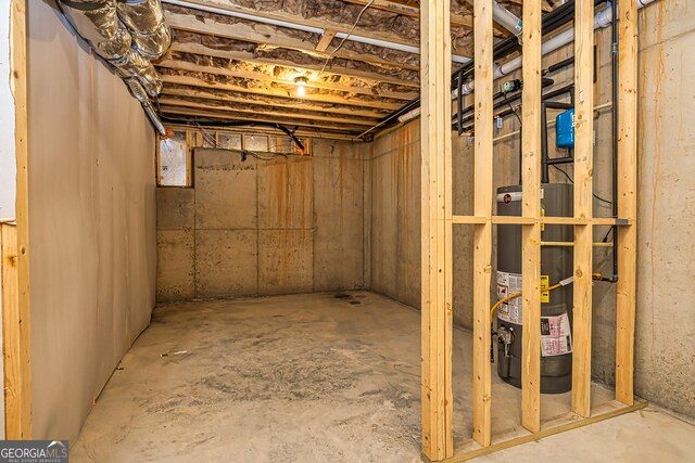 69 Oakhurst Trl, Sharpsburg, GA 30277 - unfinished below grade area with strapped water heater