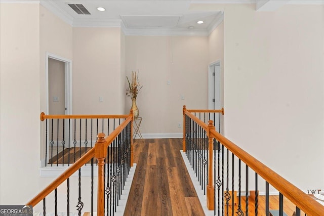 hallway with dark hardwood / wood-style flooring and crown molding