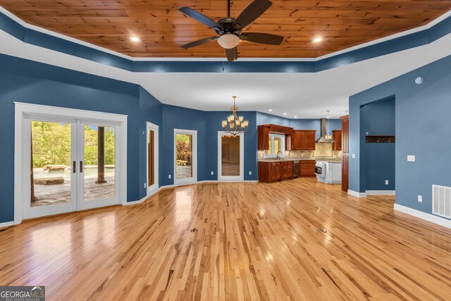 1580 Loving Rd, Morganton, GA 30560 - unfurnished living room with wooden ceiling, baseboards, ceiling fan with notable chandelier, and light wood-style flooring