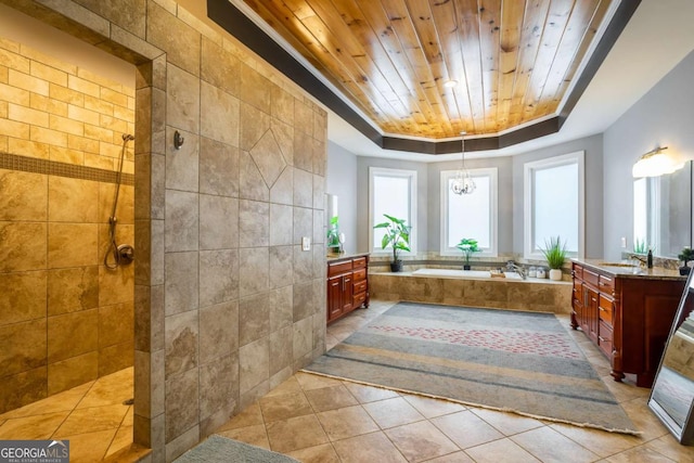 bathroom with wood ceiling, vanity, a raised ceiling, independent shower and bath, and a notable chandelier