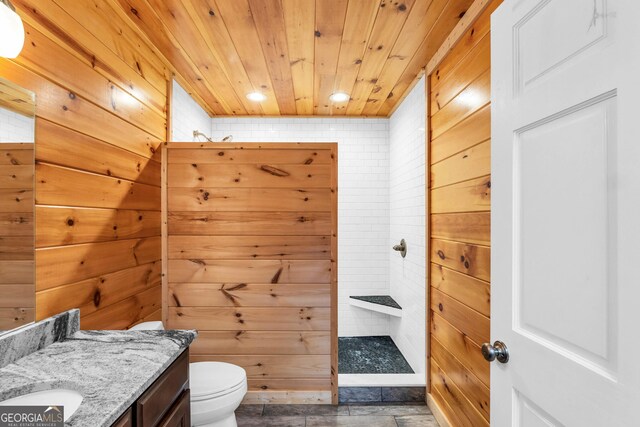 1580 Loving Rd, Morganton, GA 30560 - full bathroom with vanity, wood walls, walk in shower, and toilet