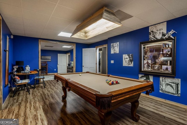 game room featuring hardwood / wood-style floors, a paneled ceiling, and billiards