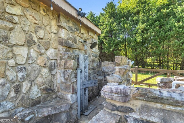 1580 Loving Rd, Morganton, GA 30560 - exterior space featuring fence and stone siding