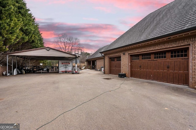 exterior space featuring a carport