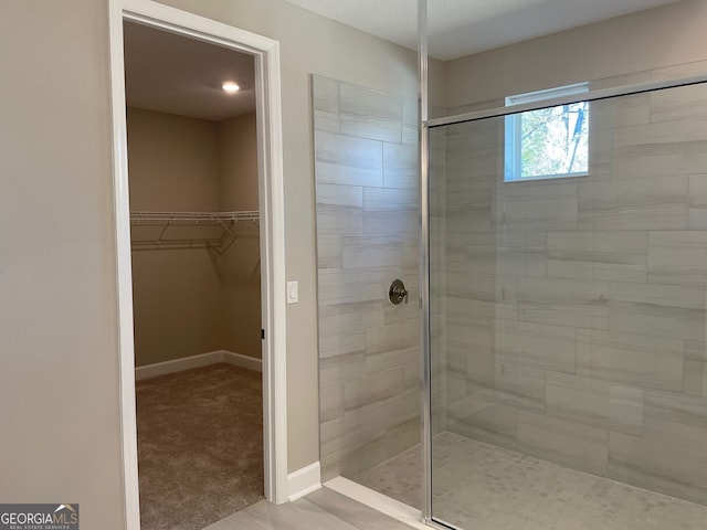 bathroom featuring an enclosed shower