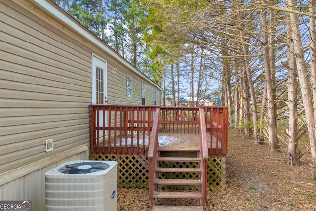 wooden deck featuring central AC