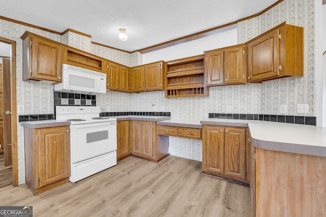 kitchen featuring ornamental molding, a textured ceiling, white appliances, and light hardwood / wood-style flooring