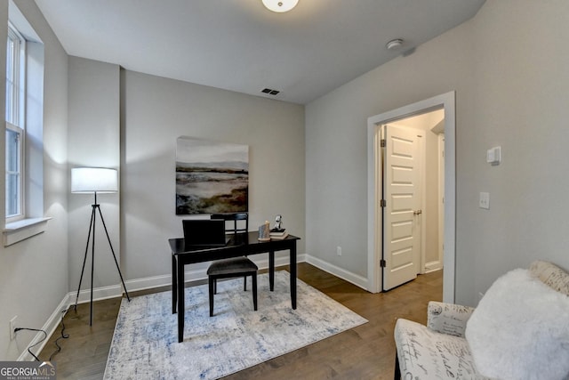 office area with hardwood / wood-style floors