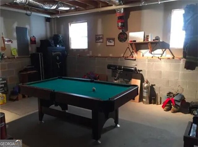 recreation room featuring pool table and concrete flooring