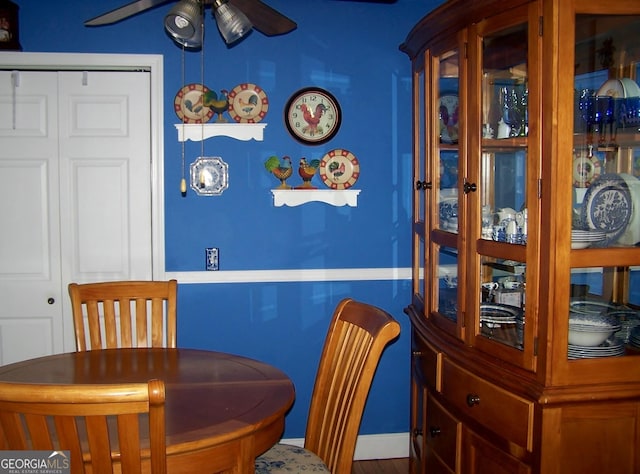 dining room featuring ceiling fan