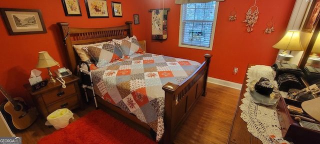 bedroom featuring dark wood-type flooring