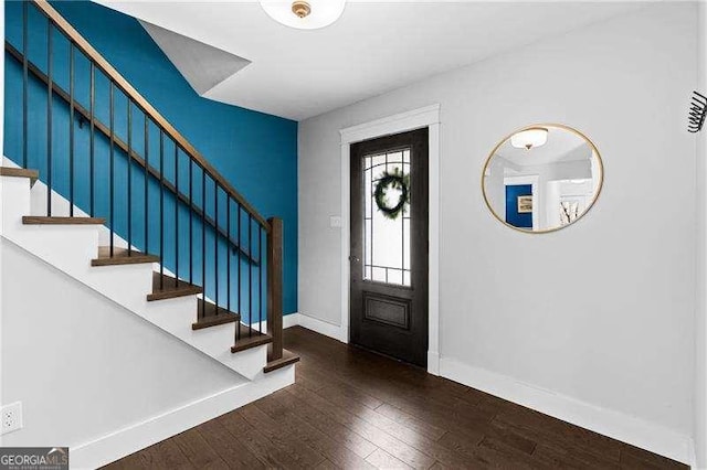 entrance foyer featuring dark hardwood / wood-style flooring