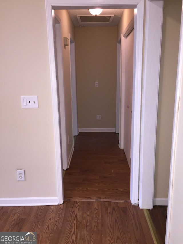 hall featuring dark hardwood / wood-style floors