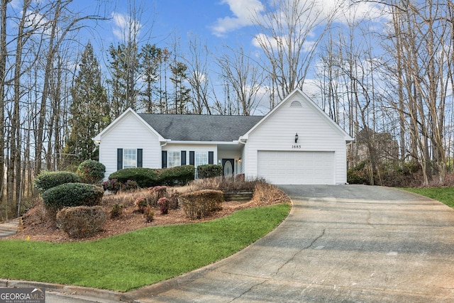 ranch-style home featuring a garage, driveway, a shingled roof, and a front yard