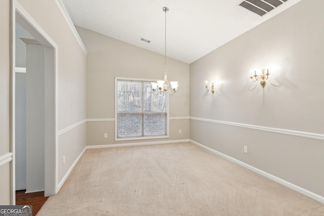 carpeted spare room with baseboards, visible vents, vaulted ceiling, and a notable chandelier